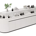 Elegant White Display Shelf Showcasing Various Bottled Products And Green Plant