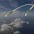 Green Missiles Flying In Blue Sky With Trailing Smoke And Clouds Over Ground
