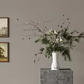 White Vase With Pine Branches White Blooms And Pine Cones On Marble Stand