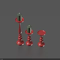 Three Red Candle Holders With Green Candles Two Lit For Home Decoration