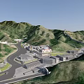 Scenic Aerial View of Green Mountain Valley With Roads and Buildings