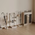 Modern Transparent And Metal Umbrella Stands With Umbrellas On Wooden Floor