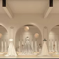Elegant Bridal Shop Display With Red Walls White Pillars And Wedding Dress Mannequins