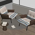 Modern Upholstered Lounge Chairs In Beige Brown With Side Table Books And Round Rug