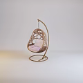 Elegant Modern Hanging Chair with Intricate Metal Frame and Pink Cushion