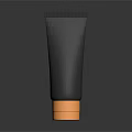 Modern Black Skincare Tube With Gold Base For Daily Beauty Use