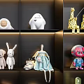 Cute Stuffed Animal Dolls Including Deer Rabbit Penguin And Giraffe On Display Shelves