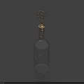 Elegant Transparent Glass Wine Bottle With Golden Ornamental Cap On Dark Blue Background