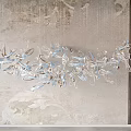 Artistic Flowing Chandelier With Blue Transparent Glass And Metal Curved Structure For Modern Interior Design