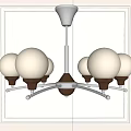 Modern Minimalist Chandelier With White Globes And Brown Bases On Metal Frame