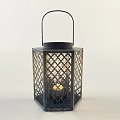 Decorative Metal Candle Lantern with Intricate Lattice Design and Burning Candle
