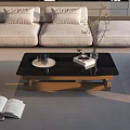 Marble and Black Glass Coffee Table with Wooden Frame and Books Glasses in Living Room