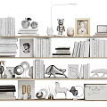Decorative Ornament Set With Books Photo Frames And Sculptures On Wooden Bookshelf