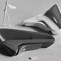 Modern Abstract Sofa Design With Sleek Curved Lines And Black White Finish