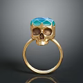 Unique Gold Ring With Skull Design And Blue Green Gemstone As Fashion Accessory