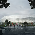 Large White Mesh Stadium Exterior With Crowded Pedestrians And Trees On Rainy Day