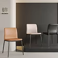 Modern Dining Chairs In Orange Beige Black With Black Metal Legs Against Gray Wall