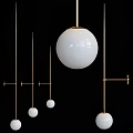 Modern Minimalist Wall Lamps With White Sphere Shades And Golden Brackets For Home Interior