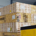 Industrial Metal Storage Racks In Warehouse With Organized Boxes Cans And Forklift