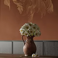Brown Ceramic Vase With White Daisies Against Orange Wall Gold Floral Patterns And Gray Panels