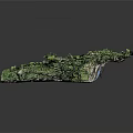 Lush Green Natural Landscape With Central Blue Water Body And Sandy Shore Areas