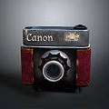 Vintage Canon Camera With Red Leather Body And Classic Lens Design