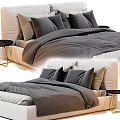 Modern Double Bed with Gray Bedding and Black Nightstands in Bedroom