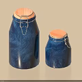 Two Blue Swirl Pattern Spice Jars With Copper Lids And Metal Clasps 3d model