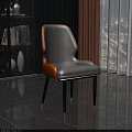 Modern White And Orange Leather Dining Chair With Black Legs And Gold Accent Feet