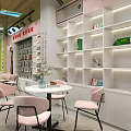 Modern Bookstore Interior With Pink Chairs Round Tables White Bookshelves And Green Plants