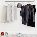 Hanging Clothes Collection with White Gray and Dark Sweaters Tops and Coats