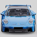 Blue Sports Car With Sleek Exterior Design And Black Alloy Wheels