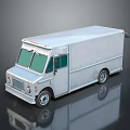 Silver Metallic Food Truck With Green Windows And Reflective Surface
