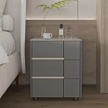 Modern Bedside Table With White Top Drawers Coffee Cup Glass And Perfume Bottles