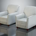 Set of Two White Striped Armchairs with Wooden Legs against Dark Background