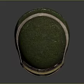 Green Moss Covered Helmet With Attached Goggles Worn And Cracked Design