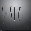 Assorted Metal Nails In Various Shapes Sizes And Rusted Details