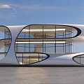 Modern Architectural Office Building With Curved Glass Facade And Open Ground