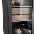 Modern Black Frame Display Cabinet With Glass Door Wooden Shelves And Golden Decorative Items