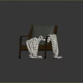 Dark Green Wooden Armchair With Black And White Houndstooth Blanket On Armrests