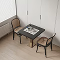 Black Dining Table Set with Rattan Chairs Placemat Vase Cups and White Cabinets