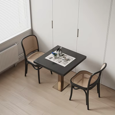 Black Dining Table Set with Rattan Chairs Placemat Vase Cups and White Cabinets 3d model