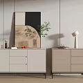 Modern Entryway And Side Cabinets Featuring Light Finish Artwork Potted Plant And Table Lamp