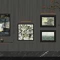 Artistic Abstract Paintings Framed on Modern Dark Wall with Decorative Plant