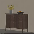 Walnut Sideboard with Cabinet Doors Drawers Black Top White Vase Yellow Flowers Brown Bowl Lemons