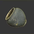 Hand Carved Blue Ceramic Sculpture With Cracked Weathered Surface On Dark Background And Light Interior