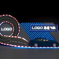 Modern Display Shelf Showcasing Blue Sports Car On Spiral Track With Neon Logo Sign