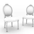 Two Classic Dining Chairs With Black Frame And Oval Beige Upholstered Backrest