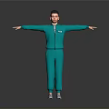 Man In Green Tracksuit Standing With Arms Outstretched On Gray Background