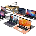 Various Laptops Including Chromebook With Sleek Design And Colorful Displays